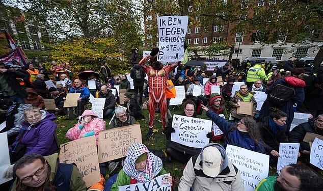 Campaigners at the Defend Our Juries protest in support of Palestine Action at The Peace Garden, Tavistock Square, central London. Picture date: Saturday November 22, 2025