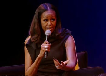 Michelle Obama has gone on a furious rant about her hair, claiming Black women have to straighten their locks to 'follow white people's beauty standards'