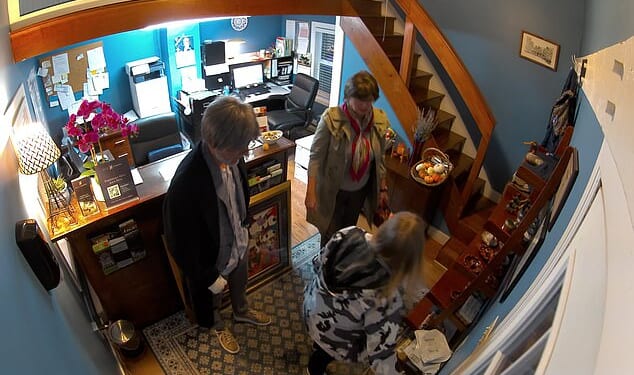 This is the moment a British holidaymaker and accomplice 'steal £30,000 of fine wine' in audacious US distraction theft as she could face up to 50 years in jail