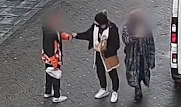 The sneaky street thief can be seen walking up to the man on Clumber Street, in Nottingham city centre, shortly after 7.30am on November 16