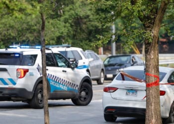 A car involved in a shooting sits outside Chicago Police Departments Morgan Park District station on July 7, 2021, in Chicago, Illinois.