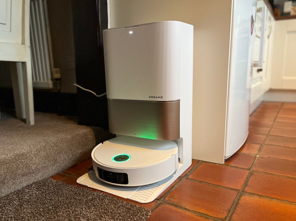 A Dreame X50 Ultra robot vacuum with its docking station.