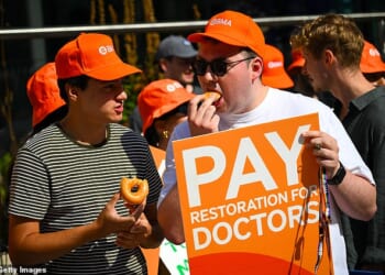 Striking doctors guzzle donuts on a BMA picket line