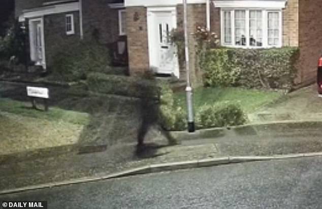 CCTV obtained exclusively by the Mail shows a man in dark clothing who is suspected of attacking a car on Langford Road