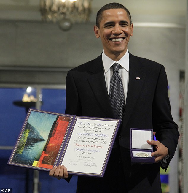 This year's most vulgar aspects of life include Nobel Prizes (pictured, former President and Nobel Peace Prize laureate Barack Obama poses with his medal and diploma at the Nobel Peace Prize ceremony at City Hall in Oslo, in 2009), Stonehenge and 'the BBC's forced jollity'