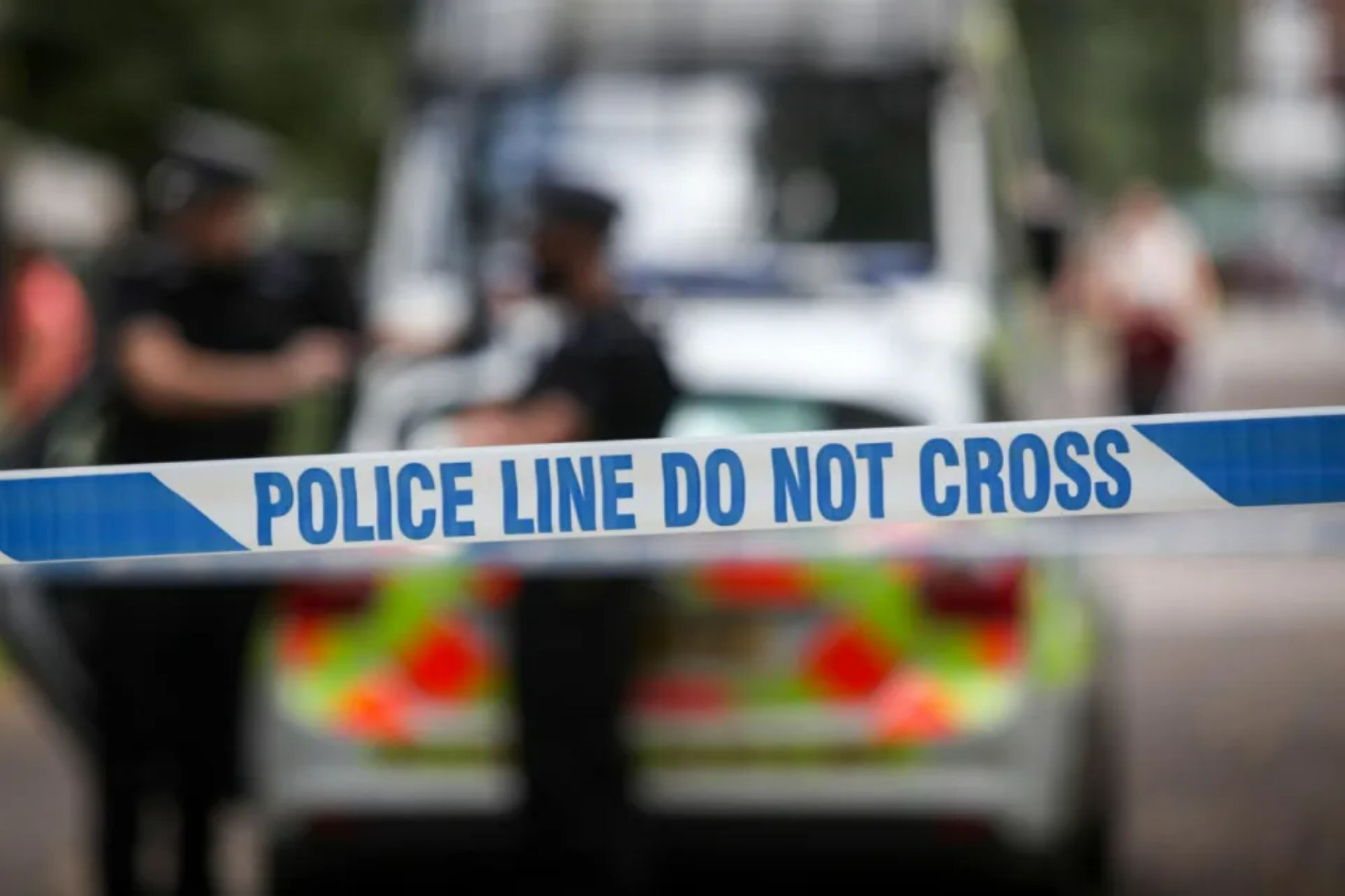 An image collage containing 1 images, Image 1 shows Police line do not cross tape at a crime scene