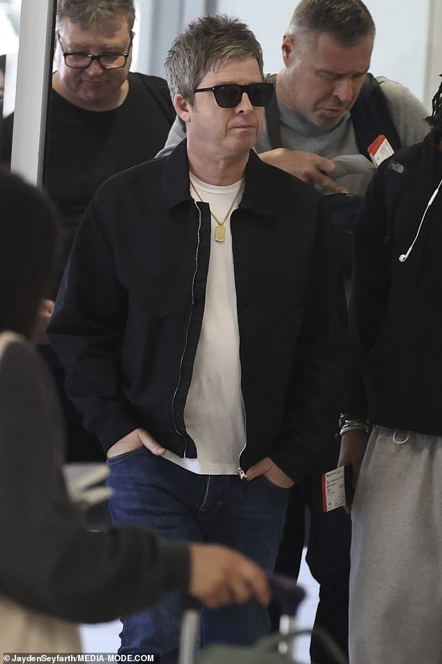 Oasis star Noel Gallagher looked effortlessly stylish on Thursday when he was spotted at Sydney Airport preparing to leave Australia, following his band's sold-out reunion tour