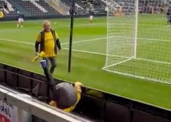St Albans City mascot Sammy the Saint tumbled over an advertising hoarding before his side's clash with Burton Albion on Saturday
