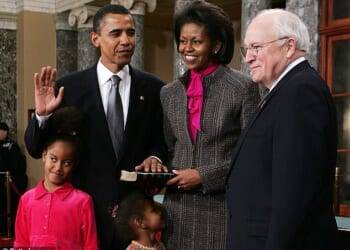 Barack Obama, his wife Michelle and their daughters Malia and Sasha as he is sworn in as a US Senator by vice president Dick Cheney on January 4, 2005, in Washington, DC