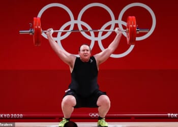 Transgender athletes will reportedly be banned from competing in female competitions at the Olympics from early next year (pictured - transgender athlete Laurel Hubbard of New Zealand)