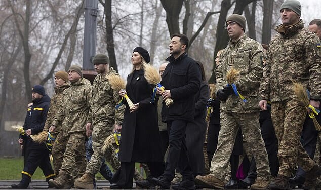 Ukrainian President Volodymyr Zelensky and his wife Olena Zelenska visit the Holodomor Genocide complex of the National Museum in Kyiv, Ukraine, on November 22, 2025