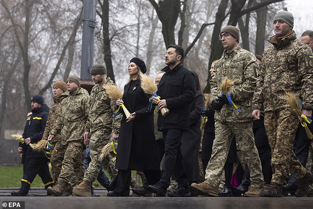 Ukrainian President Volodymyr Zelensky and his wife Olena Zelenska visit the Holodomor Genocide complex of the National Museum in Kyiv, Ukraine, on November 22, 2025