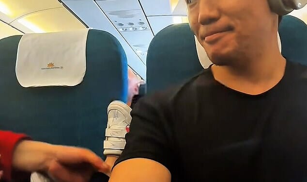 Paul Lee, originally from the U.S. but now based in Thailand , posted a short clip to his TikTok page, @iampaullee, which showed him sitting patiently in his window seat during the toddler's mid-air tantrum