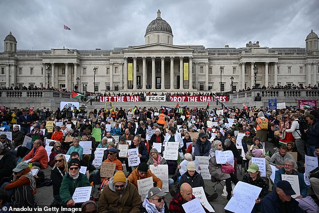 People stage a protest to demand the British government to lift its ban on Palestine Action in Trafalgar Square on on October 4, 2025