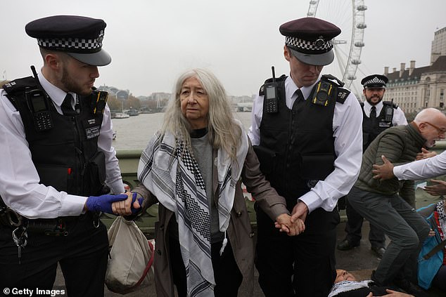 The individuals, aged between fifty and seventy-five, were arrested on the bridge on suspicion of encouraging support for a proscribed organisation contrary to Section 13 of the Terrorism Act 2000