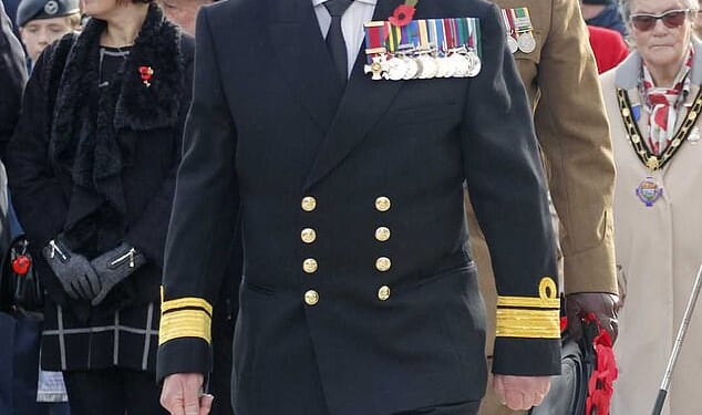 Suspected 'fake' admiral Jonathan Carley, 64, who has been charged after gate crashing a Remembrance Sunday event