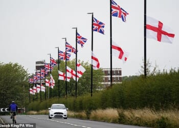 The chairwoman of the Association of Police and Crime Commissioners (APCC), Emily Spurrell, told a national conference that the surge in St George's and Union Jack flags being hung on lamp posts across the country was 'sowing fear' and 'fuelling division'