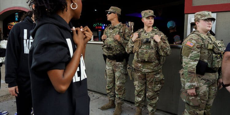 Presidents rarely use the Insurrection Act. Here’s how Trump might invoke it.