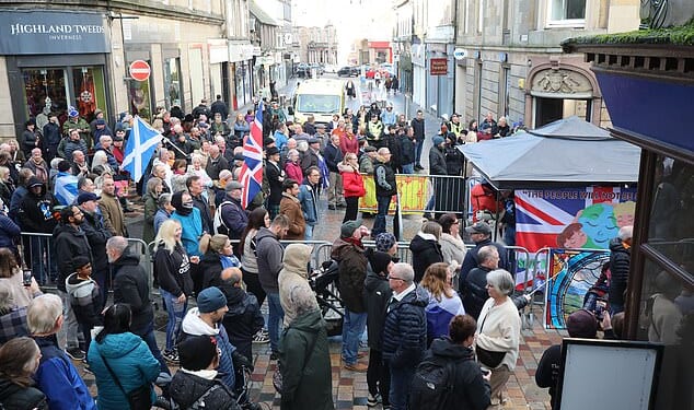 Locals gathered to protest in the city centre over the asylum plan