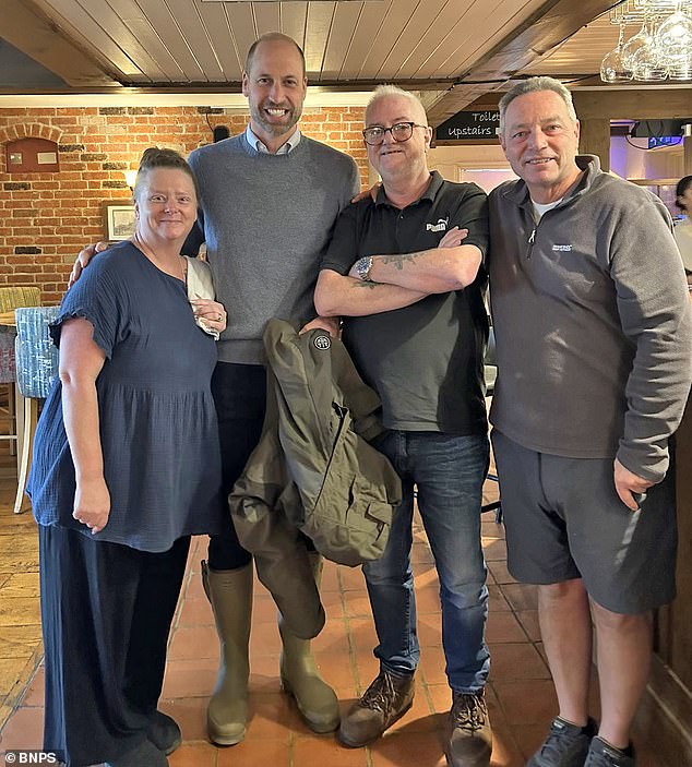 Prince William was visiting the town of Mere in Wiltshire for official Duchy of Cornwall business when he and several associates called in to the Walnut Tree Inn (Pictured with staff member Lisa James and regulars Nick Lowe and Gary Fermor)