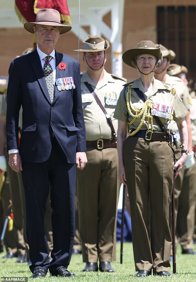 The Princess Royal looked smart in her Australian uniform as she stood alongside her husband, Sir Timothy Laurence