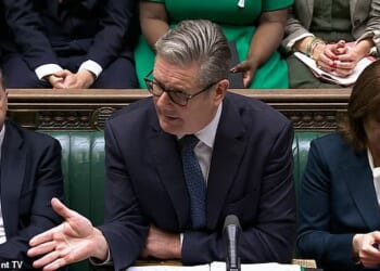 Rachel Reeves can be seen reading the news that the Budget has leaked at Prime Minister's Questions