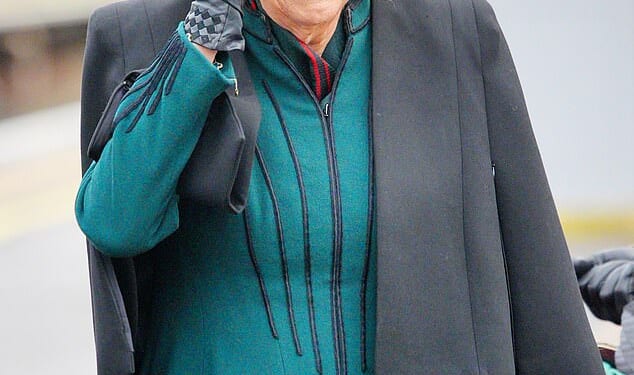 The Queen jumped onboard a train today as she took part in a 'Poppies to Paddington' initiative to mark Armistice Day. Pictured at Chippenham train station in Wiltshire this morning