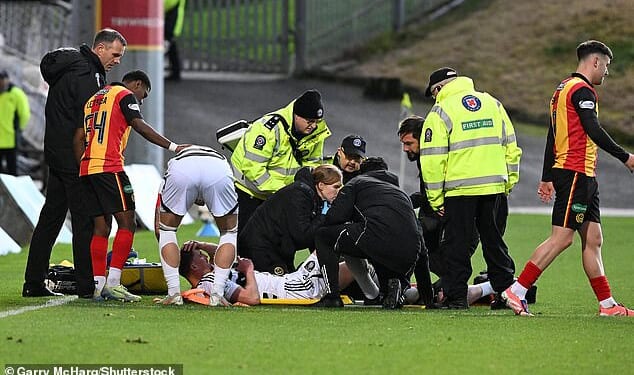 Queen’s Park defender Charlie Fox went down clutching his knee on 24 minutes
