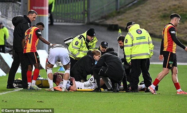 Queen’s Park defender Charlie Fox went down clutching his knee on 24 minutes