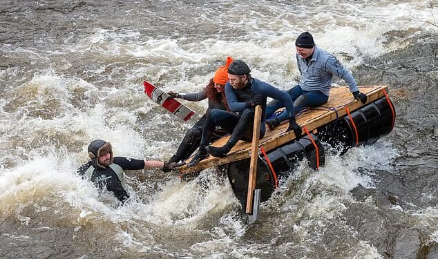 Audience members at the Boxing Day race in Matlock, Derbyshire, have been known to throw eggs and bags of flour during previous races with participants often returning fire with water pistols (Pictured: The Matlock Boxing Day Raft Race 2016)