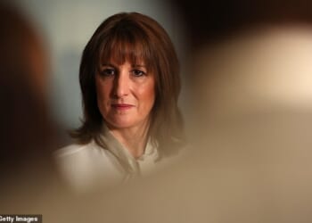 Rachel Reeves speaks to nurses and members of the media during a visit to University College London Hospital