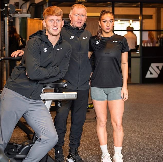 Paul Scholes, pictured at the family gym with eldest son Arron (left) and daughter Alicia (right)