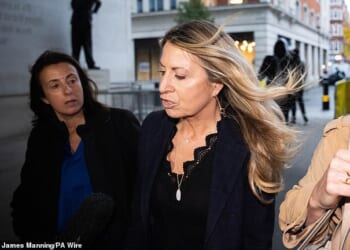 Deborah Turness (pictured centre), chief executive of BBC News, hit back at claims that the BBC was institutionally biased as she arrived at Broadcasting House Monday morning