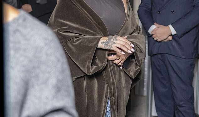 Rihanna looked as she and A$AP Rocky left Le Royal Monceau - Raffles Paris hotel on Thursday - after rapper was hit with $1m lawsuit for 'catastrophic' damages to neighbour's apartment