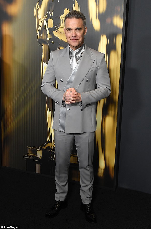 Robbie Williams, 51, fears weight loss jabs are 'making him blind' after noticing his vision rapidly deteriorating, in a worrying health update (pictured in 2024)