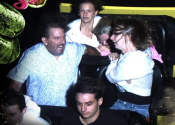 This photo taken by the Mamba roller coaster's camera captured the moment couple Chris and Cassie Evins held onto a girl in the seat behind them whose seatbelt had come loose