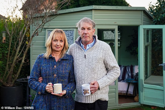 Andrew and Julie Causley (pictured) have been ordered to take down his summerhouse in their garden in Exeter