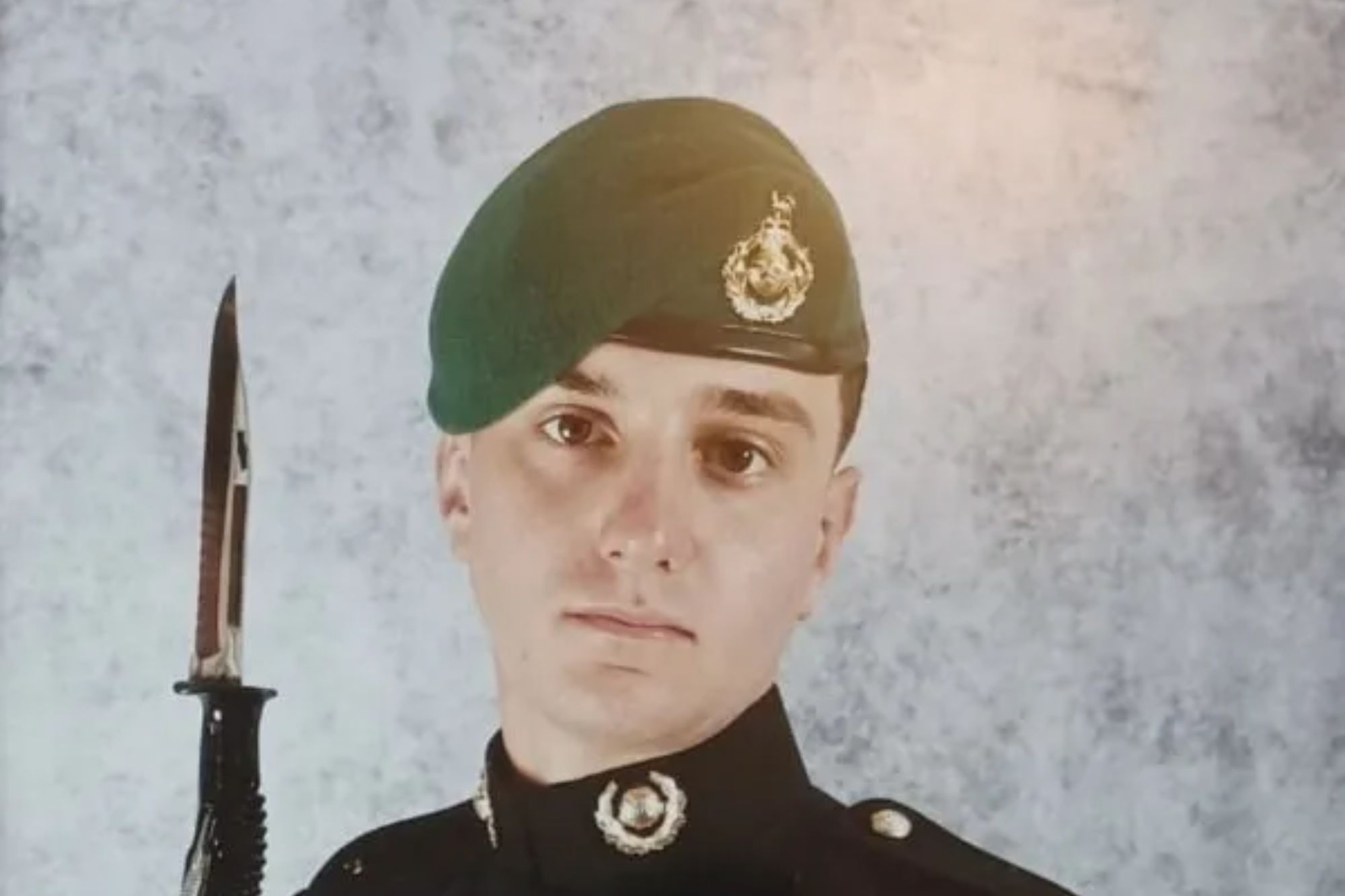 An image collage containing 1 images, Image 1 shows Joshua Houghton in military uniform with a rifle and bayonet