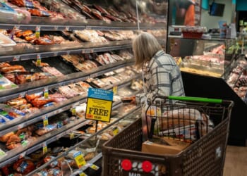 A shopper looks at a meat display on Nov. 4, 2025, at the Market 32 Supermarket in South Burlington, Vermont.