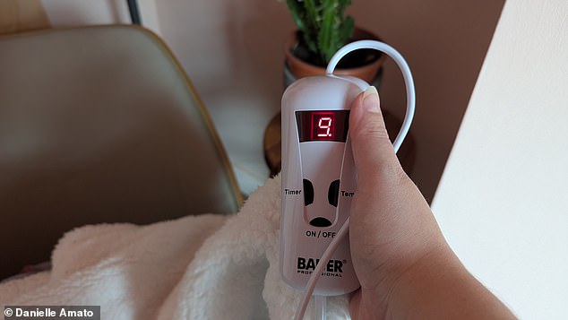 Checking out the features on Bauer's soft heated throw