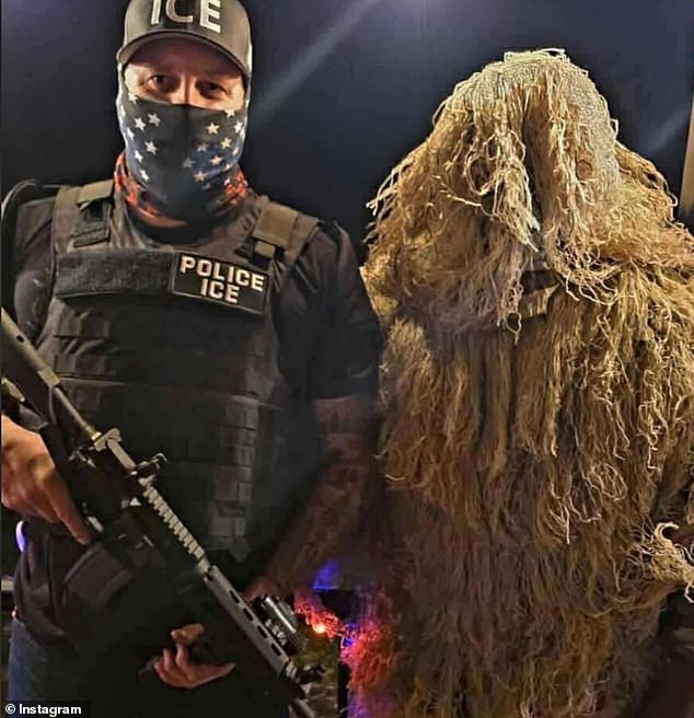 Another photo, later shared on TikTok , appeared to show the principal in the same costume, but this time holding an assault-style rifle (pictured)