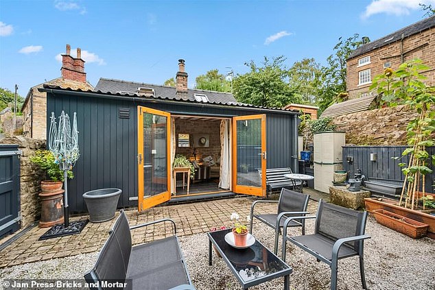 A one-bedroom property is on the market for £225,000 – but it looks more like a shed at the bottom of a garden
