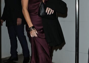 Joanne Beckham, 43, leaves Gordon Ramsay¿s restaurant in Chelsea, west London, wearing a burgundy silk dress designed by her sister-in-law Victoria after her brother David was knighted
