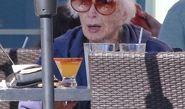 Shirley MacLaine, 91, sipped on a refreshing cocktail as she stepped out for a rare outing in Malibu on Tuesday