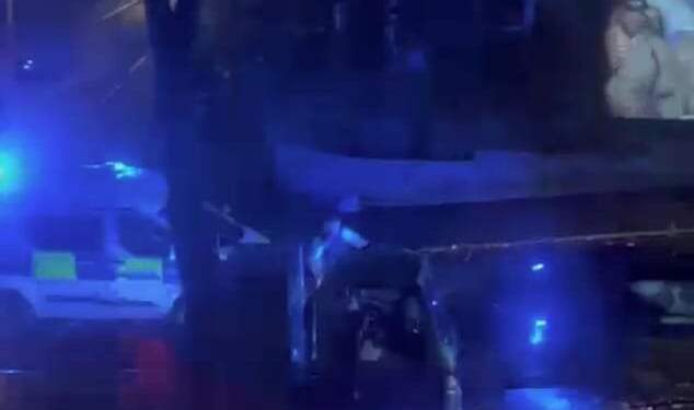 In the footage, filmed from a nearby window, a pickup truck can be seen driving down a residential street in Lewisham - in southeast London - as a police officer and a police van follow behind