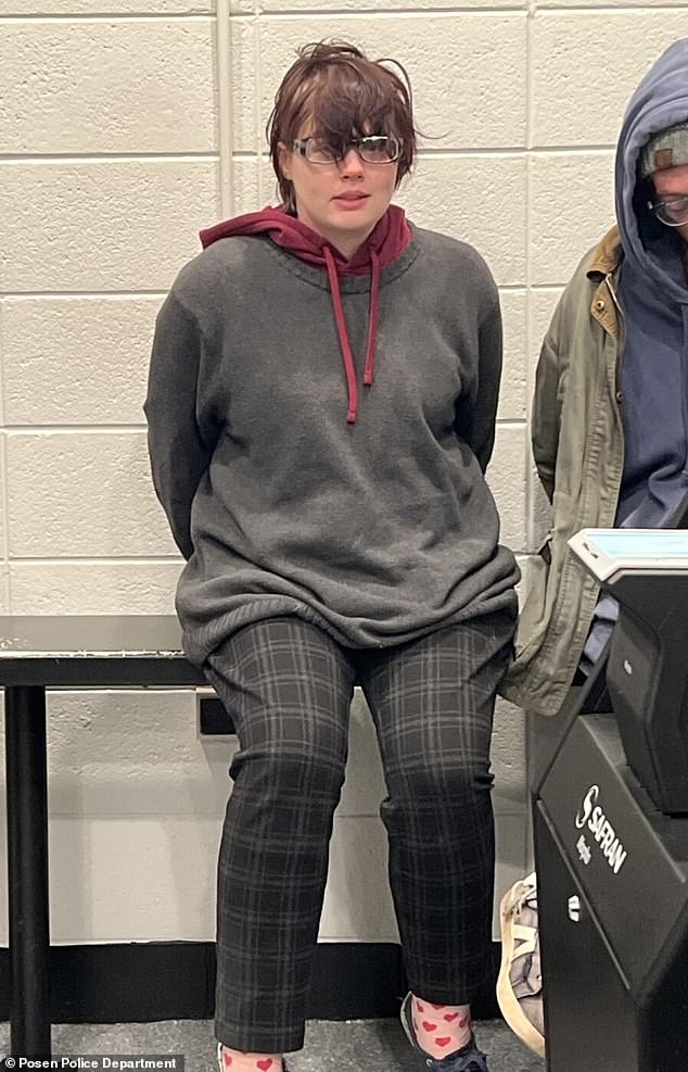 Geyser seen in the custody of Posen, Illinois police after her arrest over the weekend