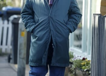 Soap legend looked unrecognisable 30 years on from his last iconic TV role with his groomed bushy beard as he strolled down the streets of Essex on Tuesday