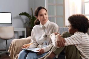 Therapist Talking to Young Boy