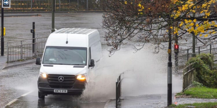 Storm Claudia batters Britain with 6-INCHES of rain as Met Office warns of flooding and 'do not travel' alert issued