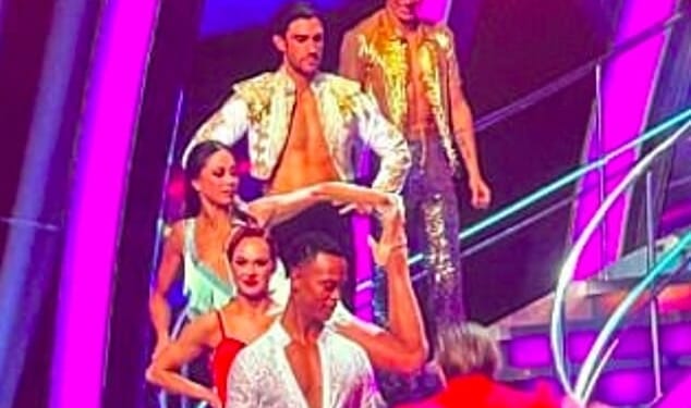 Strictly fans appeared to spot professional Katya Jones instructing her partner Lewis Cope before the Instant Dance challenge on Saturday night's episode